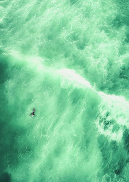 Surfer in turquoise water poster