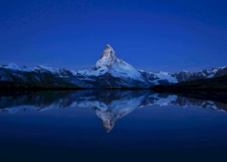 Matterhorn mirroring in lake Stellisee poster